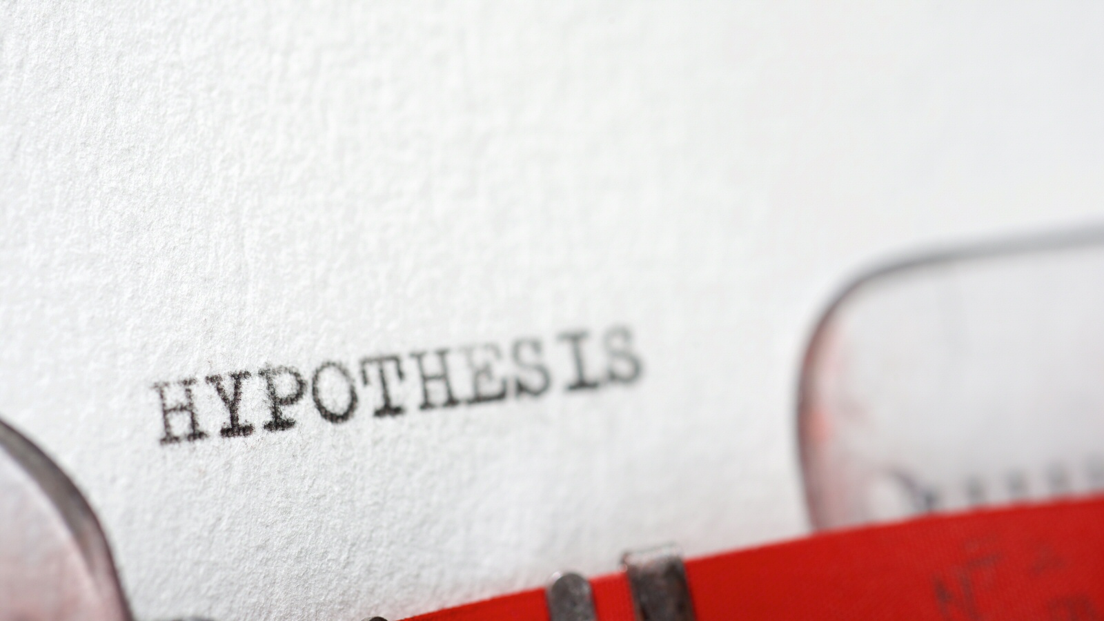 Skrivemaskine har skrevet ordet Hypothesis