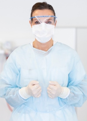 Staff member wearing personal protective equipment